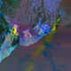 Sulfur dioxide plumes from the recent eruptive activity at Kilauea are shown in yellow and green.